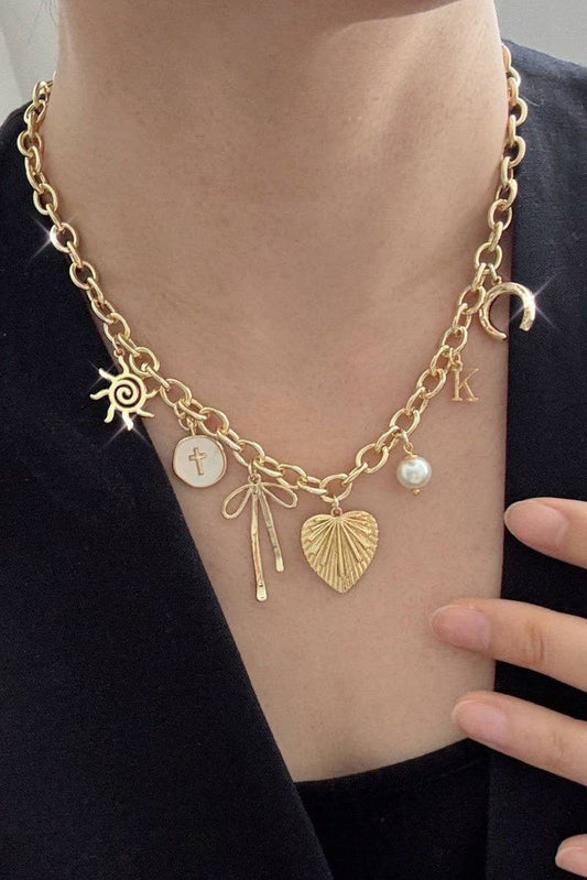 SUN BOW PEARL CROSS DISC U CHARM NECKLACE